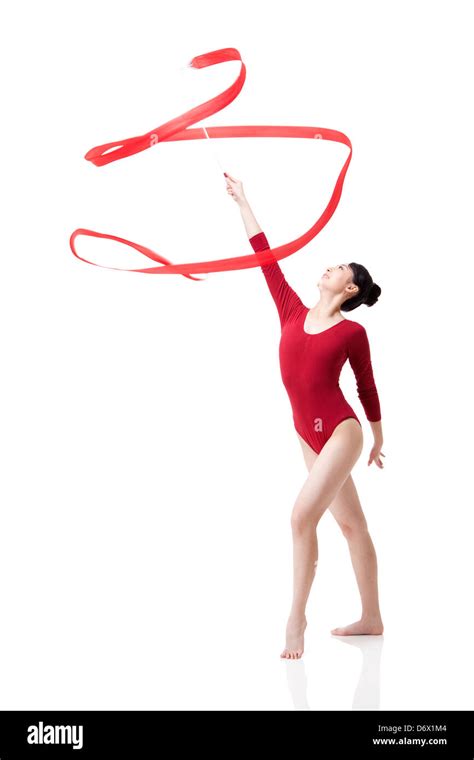 Female Gymnast Performing Rhythmic Gymnastics With Ribbon Stock Photo