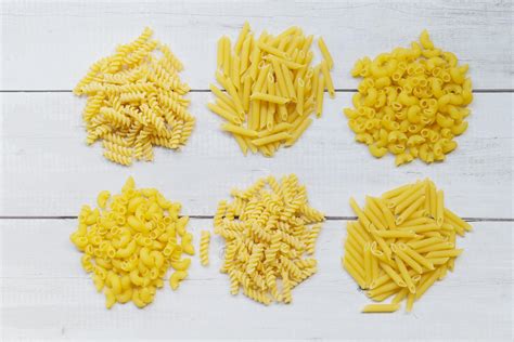Raw Pasta Various Kinds Of Uncooked Pasta Macaroni Spaghetti And
