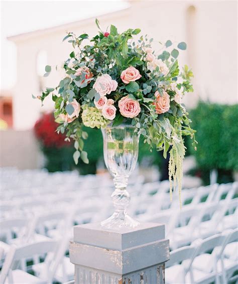 24 white padded americana folding chairs bamboo arch with draping signing table small or large with 2 chairs aisle chair. Enchanting Montelucia Wedding | Wedding centerpieces ...