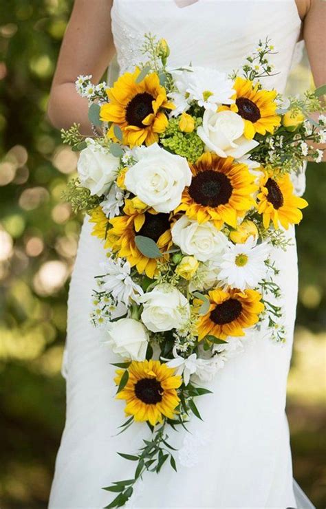 Here, we're showcasing some of our favorite sunflower wedding bouquets sunflowers are the perfect summer flower: Sunflower bridal bouquet, cascading bouquet, wedding ...