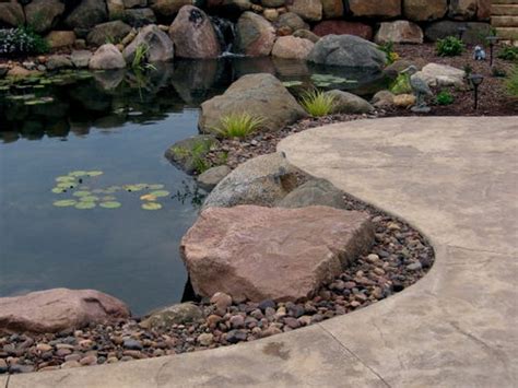 Landscaped Ponds Waterfalls Add A Soothing Oasis To Your Backyard