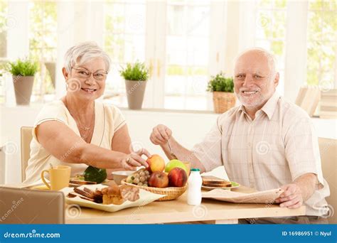 Elderly Couple Having Breakfast Stock Image Image 16986951