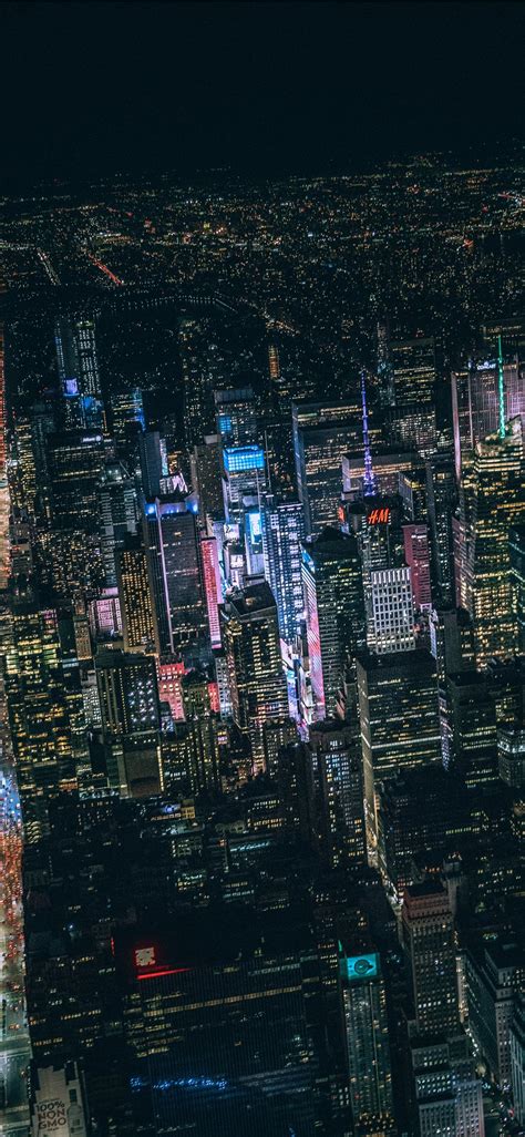 Aerial View Of City Buildings During Night Time Iphone X Wallpapers