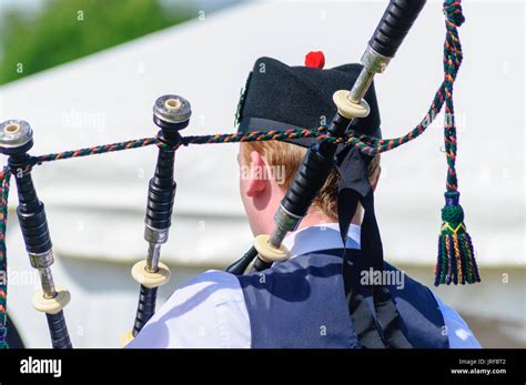 Scottish Highland Piper Stock Photos & Scottish Highland Piper Stock