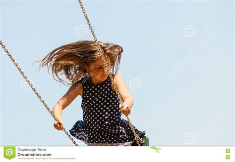 Playful Crazy Girl On Swing. Stock Image - Image of play, playful: 76429229