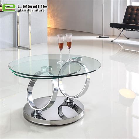 Make your living space more inviting with a well placed coffee table to complement the rest of the living room ensemble. China Rotatable Tempered Glass Coffee Table with Stainless ...