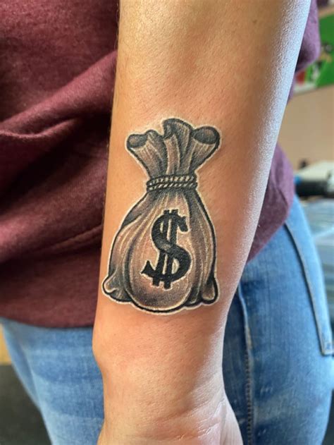 Check out our gallery of money tattoo designs and drawings, and you'll discover a number of awesome ideas to inspire you. Detailed money bag tattoo on wrist in 2020 | Money bag tattoo, Tattoos, Money bag