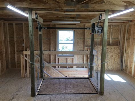 The Attic Lift Is A Garage Lift System That Is Motorized Attic Lift
