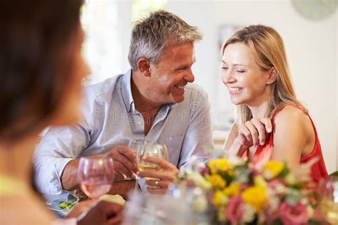 Mature Friends Sitting Around Table Dinner Party Stock Photos Free