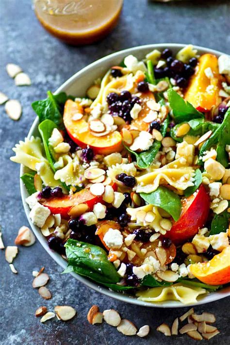 Dress with a mustard vinaigrette. Blueberry Peach Feta Spinach Pasta Salad