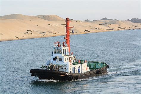 a tug boat on the suez canal photo