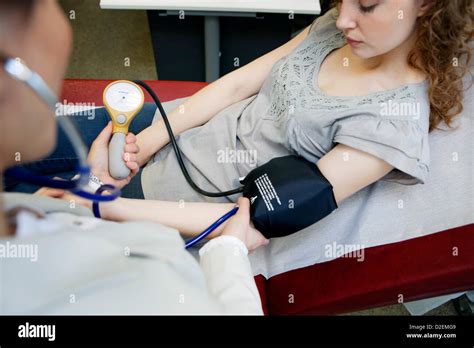 Blood Pressure Woman Stock Photo Alamy