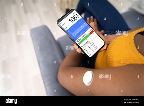 Continuous Glucose Monitor Blood Sugar Test Smart Phone App Stock Photo