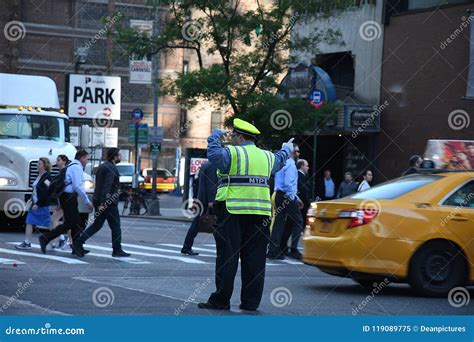 nypd cop directing traffic in nyc editorial photo 14508019