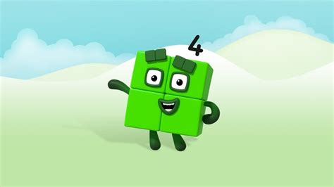 A Green Cube With Eyes And Arms In The Air