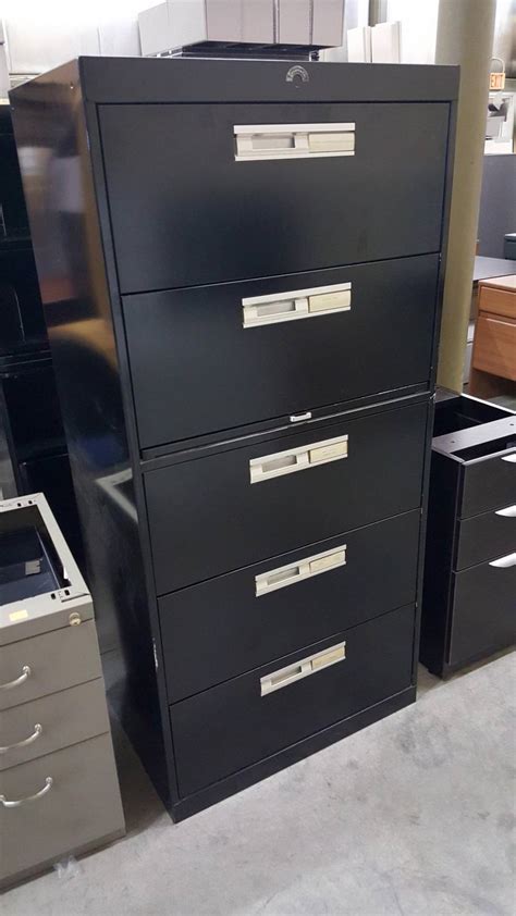 Built with volume, style and strength in mind, it can accommodate stacks of paperwork without taking up much floor space. Roll Out Conserv-A-File 5 Drawer Lateral File Cabinet ...