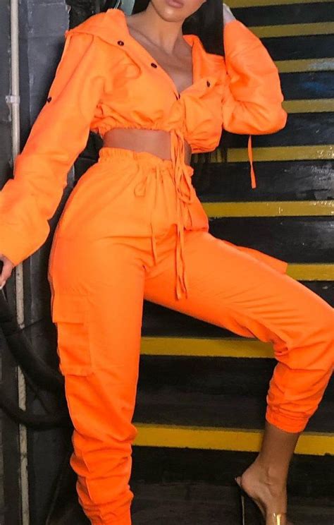 neon orange button up tracksuit set aliya neon outfits orange outfit neon fashion