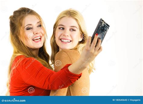 Two Women Taking Selfie Using Smartphone Stock Image Image Of Young Camera 182645643