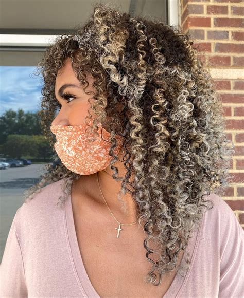 Curly Dark Brown Hair With Blonde Highlights