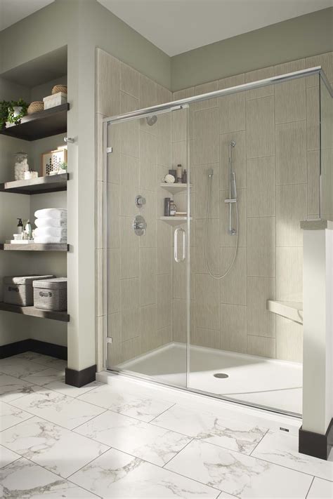 Ada compliant transfer shower stalls and ada roll in showers are available as one piece or multi piece units. Low threshold walk-in shower with corner bench and ...