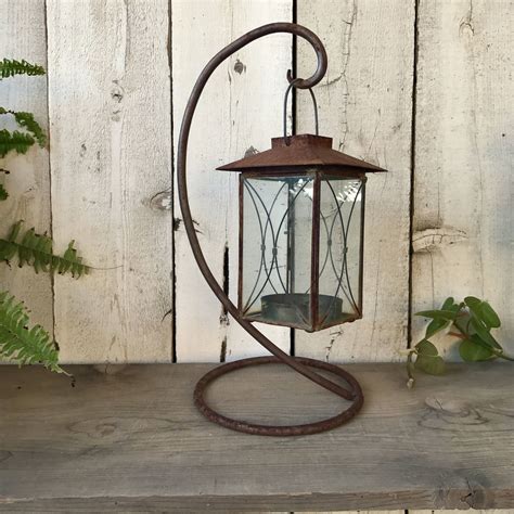 Old Rusty Metal And Glass Candle Lantern With Wrought Iron Etsy Glass Candle Lantern Candle
