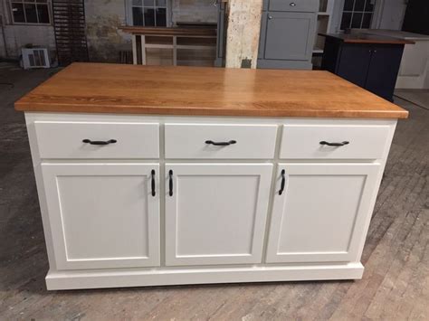 Kitchen island seating also varies in height. Item E517 Custom Kitchen Island with Seating and Storage ...