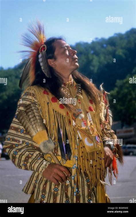 Cherokee Man Dressed In Traditional Pow Wow Regalia During A Fall