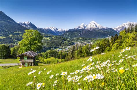 Idyllic Summer Landscape In The Alps With Mountain Cottage Stock Photo