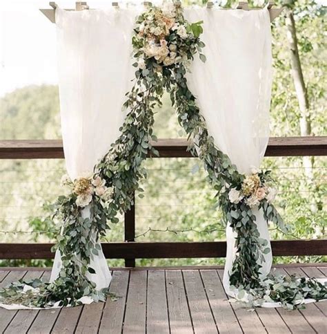 Pin By Brooke Johnson On Wedding Greeneryflowers Wedding Arch Tulle