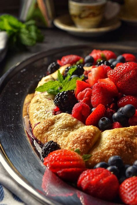 Laura shows us the italian way to make a delicious cold treat! Berry Crostata -The perfect Italian summer dessert with fresh strawberries, blueberries and ...