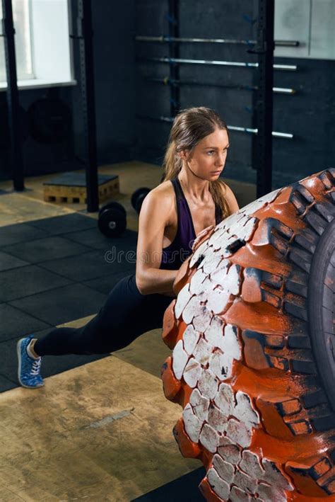 Strong Woman Flipping Tire In Crossfit Stock Photo Image Of Active