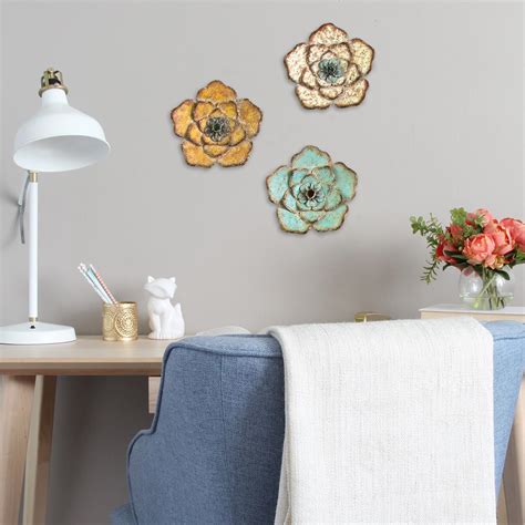 Although beautiful furniture plays a big role in creating an inviting home or with a wide array of types and sizes, there's a wall clock for every interior space, from bathrooms and bedrooms to kitchens. Stratton Home Decor Rustic Metal Flower Wall Decor (Set of ...