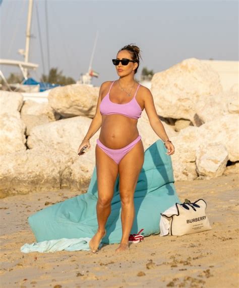Lauryn Goodman Looks Incredible As She Shows Off Baby Bump In Purple