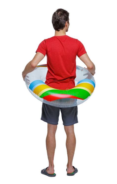 Front View Of A Man In Shorts With An Inflatable Circle Stock Image Image Of Handsome