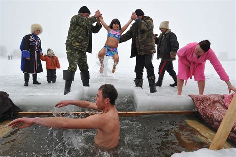 Russian Orthodox Christians Plunge Into Icy Rivers And Lakes To