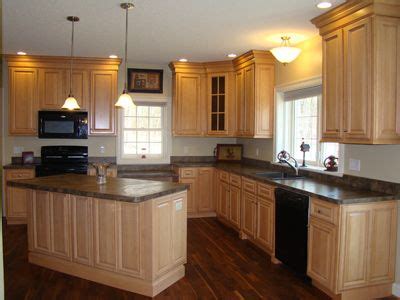 In case your kitchen cabinets look a little rusty in the outside, but you're content with their quality, then all you have to do is to shift up things a bit. 42 inch kitchen cabinets | natural maple cabinetry with ...