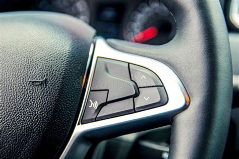 Control Buttons On The Steering Wheel Of The Car Close Up Stock Photo