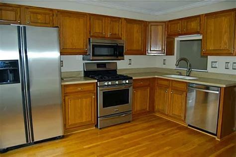 You'll never believe some of these cabinets have been around since as far back as the '80s! Kitchen Cabinet Redo - According to Kasi