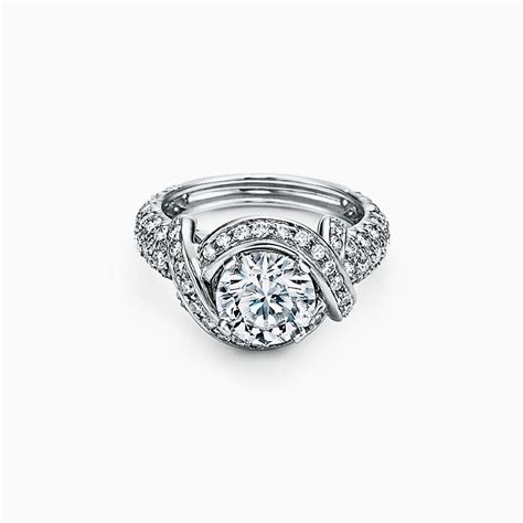 Tiffany embrace® band ring with a half circle of round brilliant diamonds in platinum. Engagement Rings | Tiffany & Co.