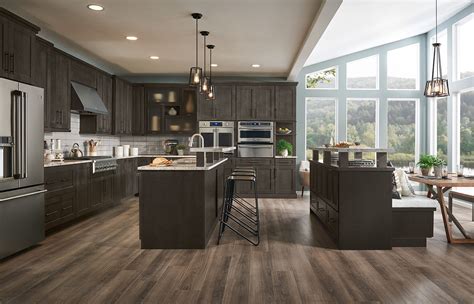 The transitional kitchen's masterpiece is the gorgeous hood with a great island! Cherry Slate Archives | Shenandoah Cabinetry