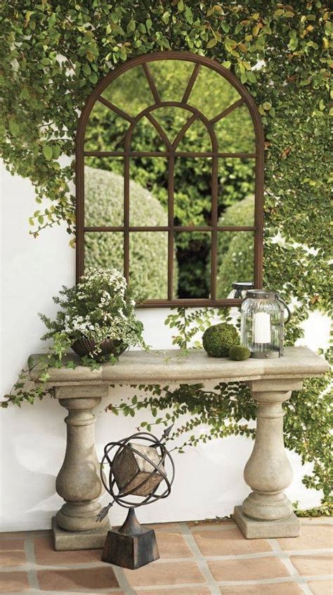 Garden Mirrors Are The Most Popular Gardening Trend Right Now