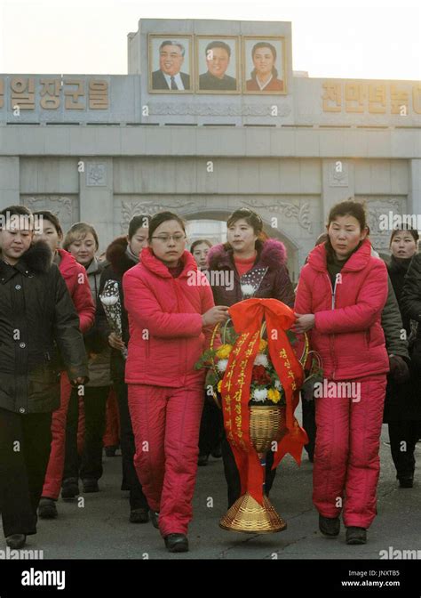Pyongyang North Korea People Offer Flowers At The Grounds Of The