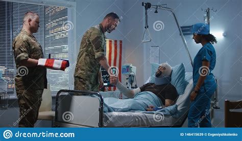 Injured Soldier Receives Badge Of Honor In Hospital Stock Image Image