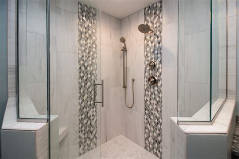 Gray Tiled Shower With Gray Mosaic Accent Strips And Custom Glass