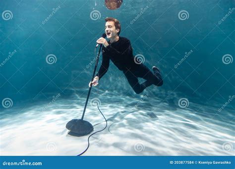 Singer Man With Microphone Underwater Copy Space Art Stock Photo