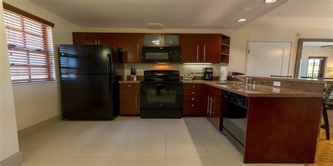 Unfurnished room with own bathroom in a condo. ONE BEDROOM CONDO SUITE at the MarBrisa Carlsbad Resort