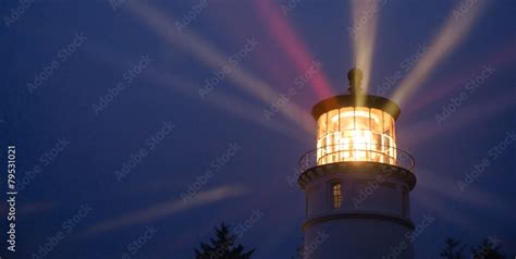 Lighthouse Beams Illumination Into Rain Storm Maritime Nautical Stock