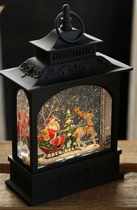 Battery Operated Picture Window Water Lantern Featuring Santa Driving