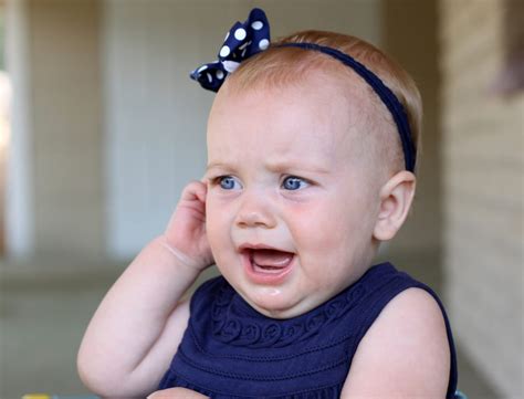 Baby Girl Holding Her Ear In Pain Pillars Of Health