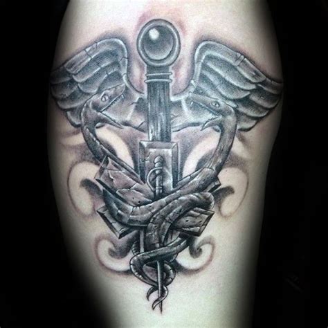Caduceus Tattoo Designs For Men Manly Ink Ideas Caduceus Tattoo Tattoo Designs Men Arm